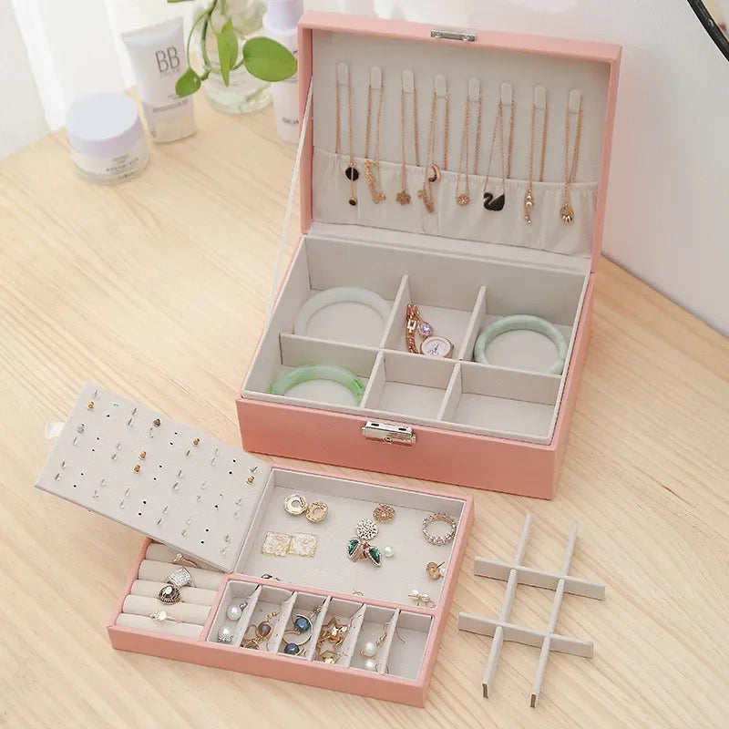 Clarify.pk double layer jewelry organizer in pink with compartments for rings, bracelets, and necklaces
