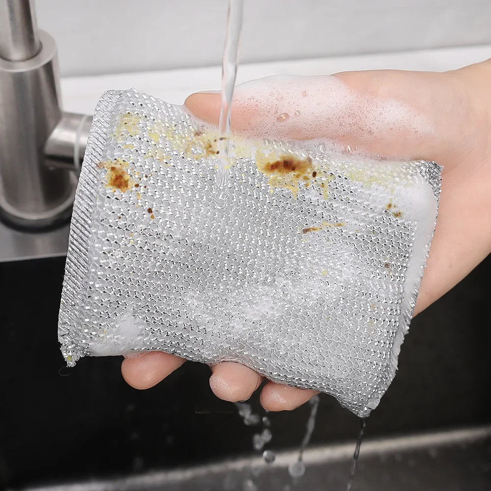 Clarify.pk double sided kitchen cleaning sponge pack of 4 held under running water to remove grease