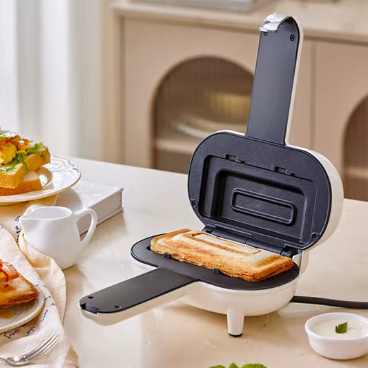 Clarify.pk double sided sandwich press with toasted sandwich inside on kitchen countertop