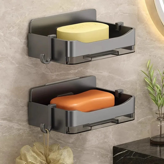 Clarify.pk wall mounted soap holder in black metal with dual shelves holding soap bars on bathroom wall