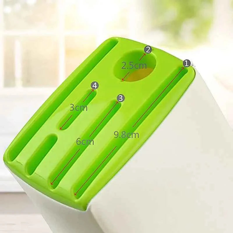 Durable kitchen knife holder in green with multiple slots for organizing knives safely