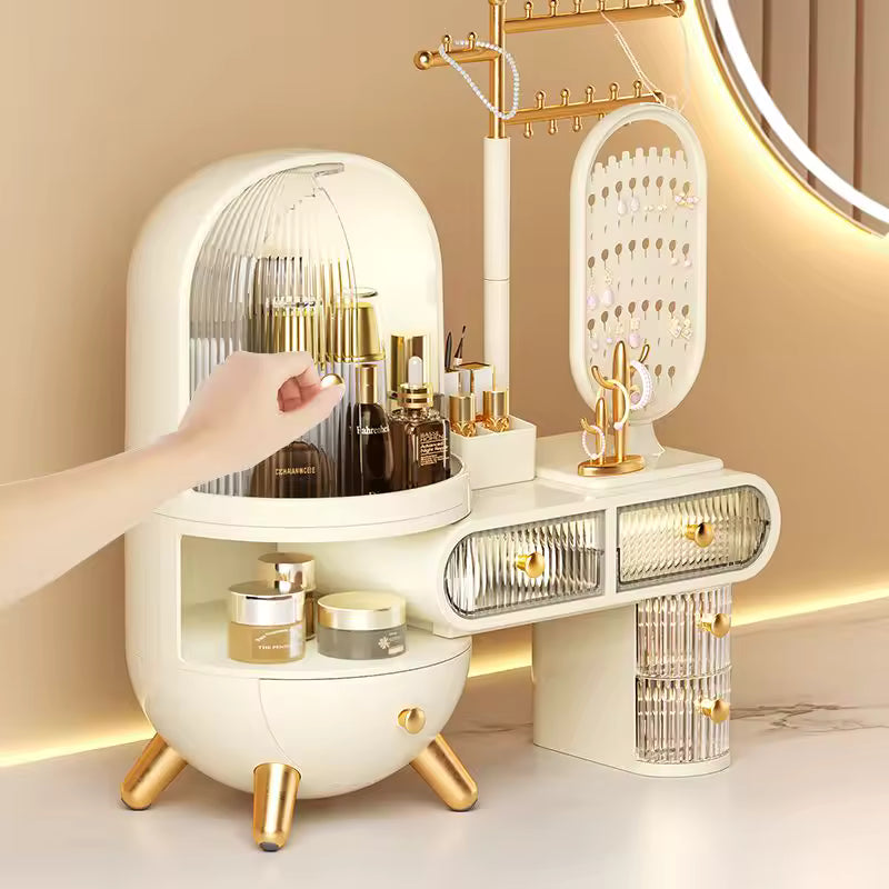 Clarify.pk dustproof jewelry storage box with compartments and gold accents on vanity table