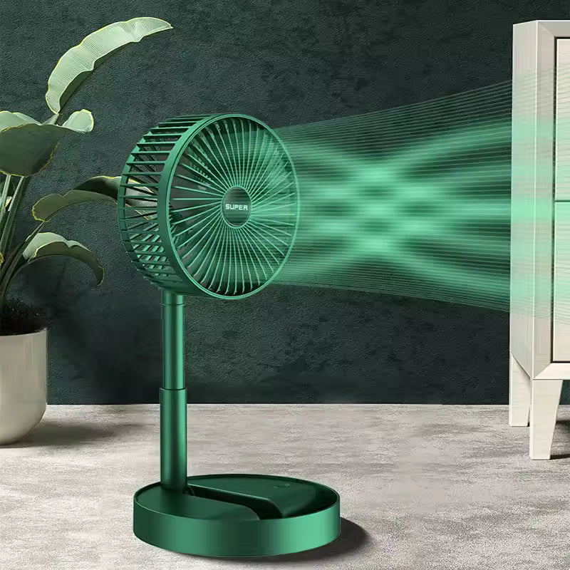 Green mini foldable fan for dormitory by Clarify.pk on a desk with airflow showing