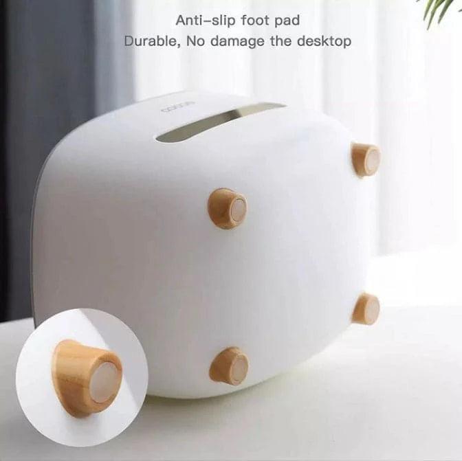 White Ecoco tissue box holder with anti-slip wooden foot pads to protect desktop surfaces