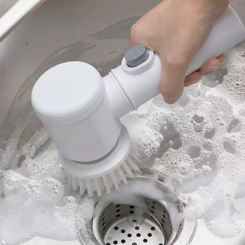 Clarify.pk electric cleaning brush scrubbing a sink drain with soap suds for household cleaning
