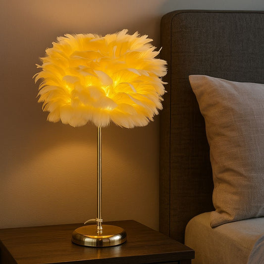 Clarify.pk electric feather lamp with warm yellow light on bedside table near bed