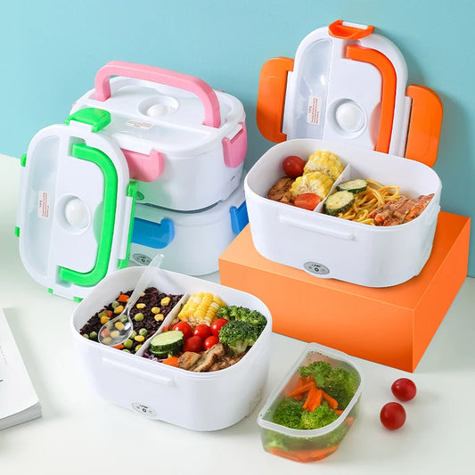 Clarify.pk electric heated lunch box with multiple compartments holding vegetables and pasta