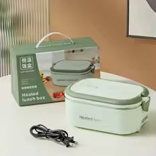 Compact electric lunch box in light green with detachable power cord and carrying handle