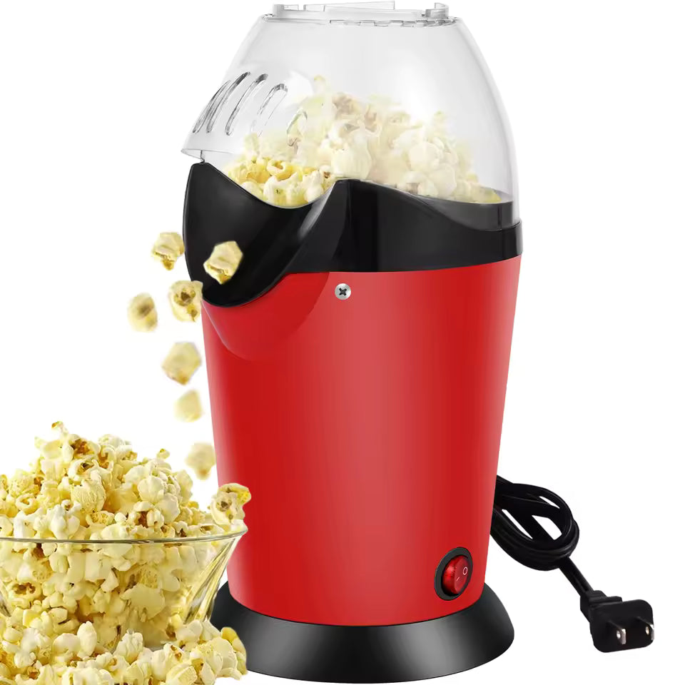Willstar electric popcorn maker machine in red popping fresh popcorn into a glass bowl