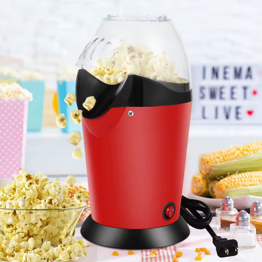 Willstar electric popcorn maker machine in red popping fresh popcorn with corn cobs and popcorn bowl nearby