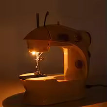 Electric sewing machine with light illuminated on beige model by Clarify.pk
