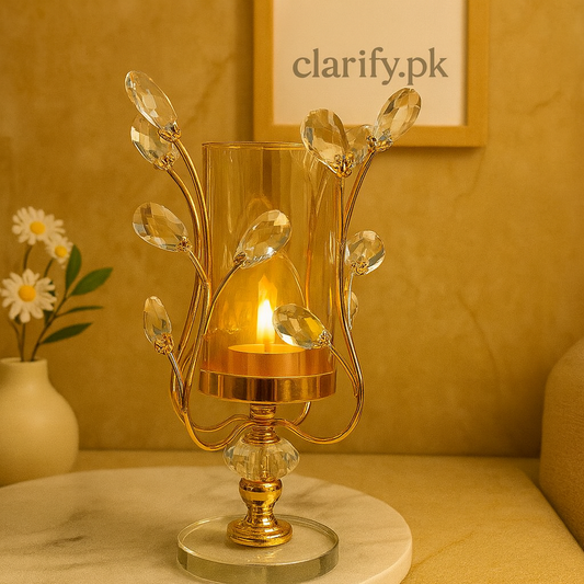 Elegant crystal candle holder with gold metal branches and clear glass shade on round base