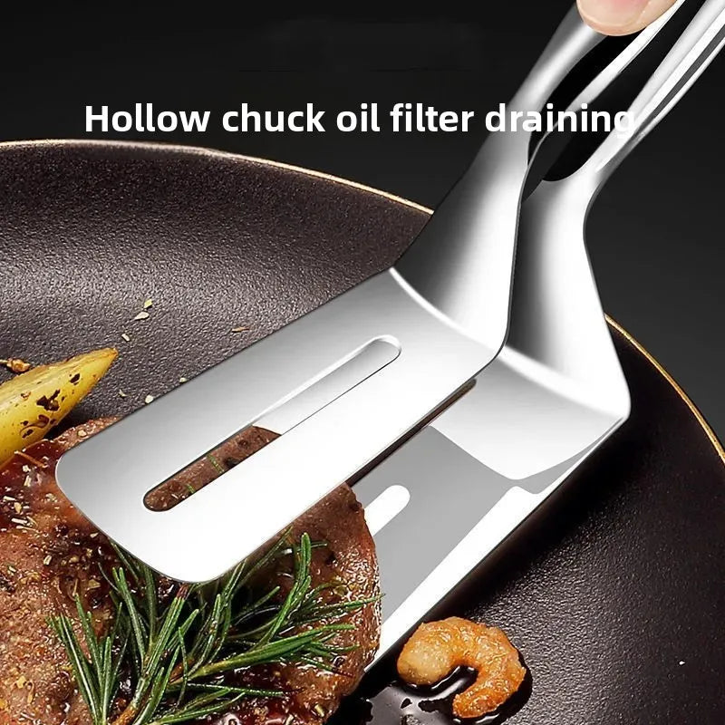 Extra thick stainless steel spatula lifting steak with herbs from a black frying pan