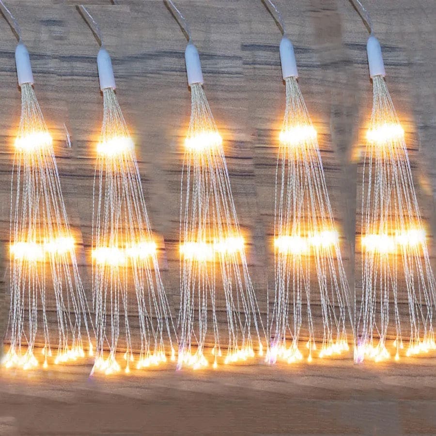 Clarify.pk firework string lights battery operated with warm glowing LED bulbs on wooden surface