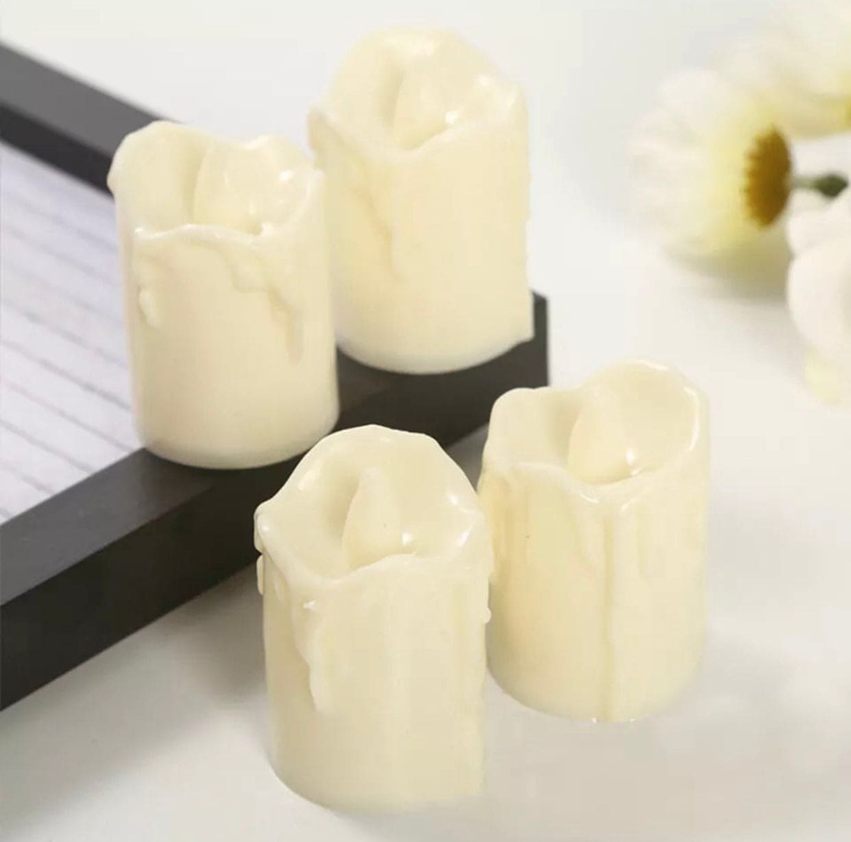 Clarify.pk flameless LED tea lights set with realistic melting wax design for safe indoor decoration