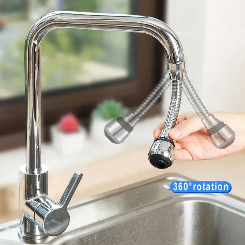 Clarify.pk 360 rotating faucet extender attached to kitchen faucet over sink with hand adjusting it