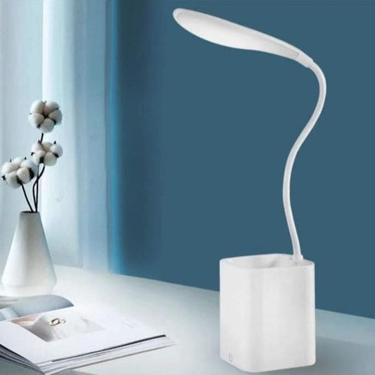 White flexible smart LED desk lamp with curved neck and rectangular base on a white desk