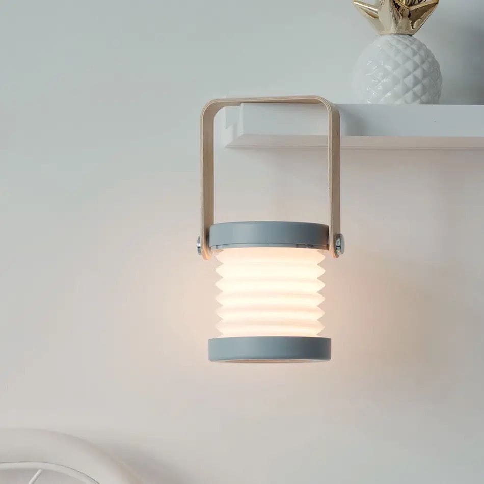 Clarify.pk foldable LED table lamp with wooden handle and soft white light mounted on wall