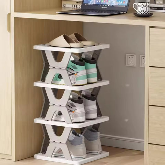 Clarify.pk foldable shoe rack holding multiple pairs of shoes neatly under a wooden desk