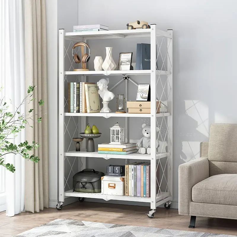 White folding wrought iron shelf with four tiers holding books, decor, and storage boxes