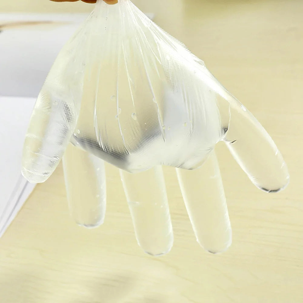 Clear food grade disposable gloves on hand for safe and hygienic food handling