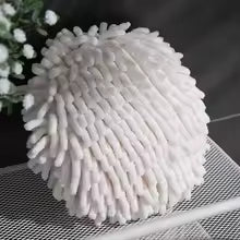 White fuzzy ball microfiber hand towel with soft textured fibers for gentle drying