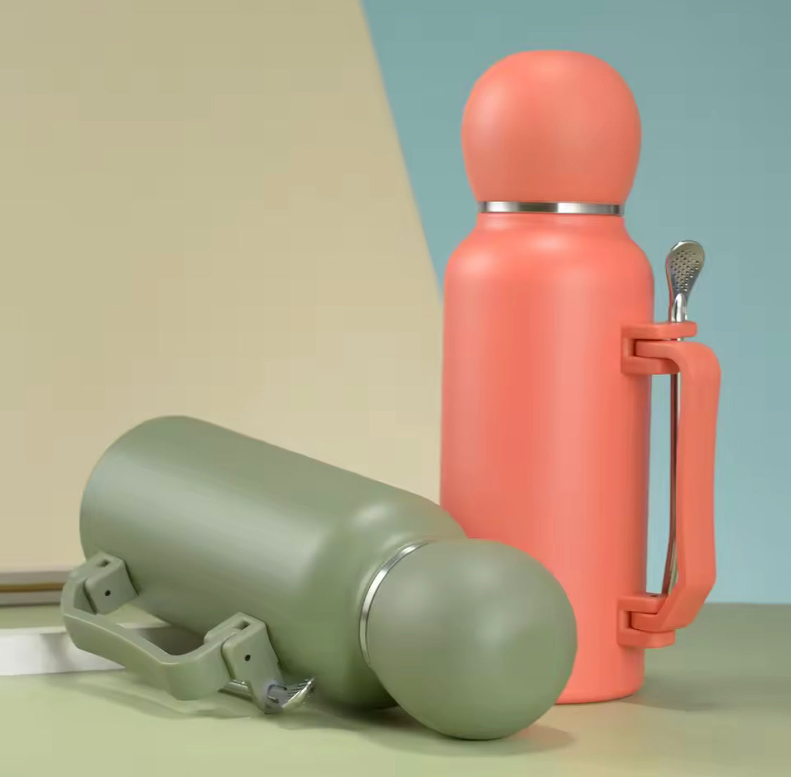 1200ml stainless steel thermos bottles in pink and green with handles and attached straws