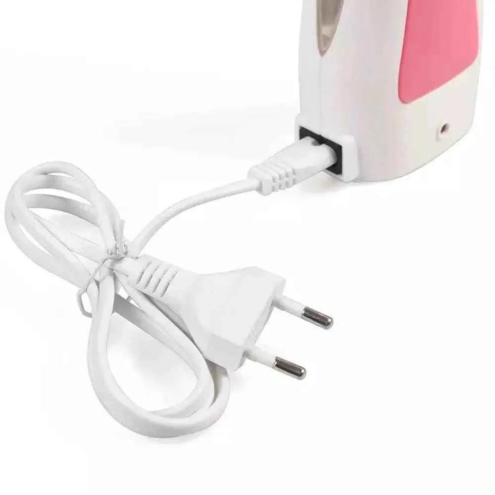 Clarify 3 in 1 wax heater electric plug and cord attached to a white and pink device