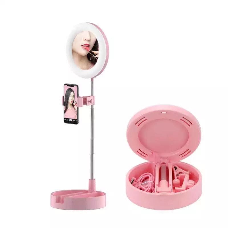 Pink foldable selfie stick with ring light and phone holder with compact storage case by Clarify.pk