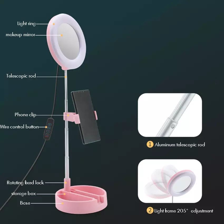 Pink foldable selfie stick with ring light featuring makeup mirror, phone clip, and aluminum telescopic rod