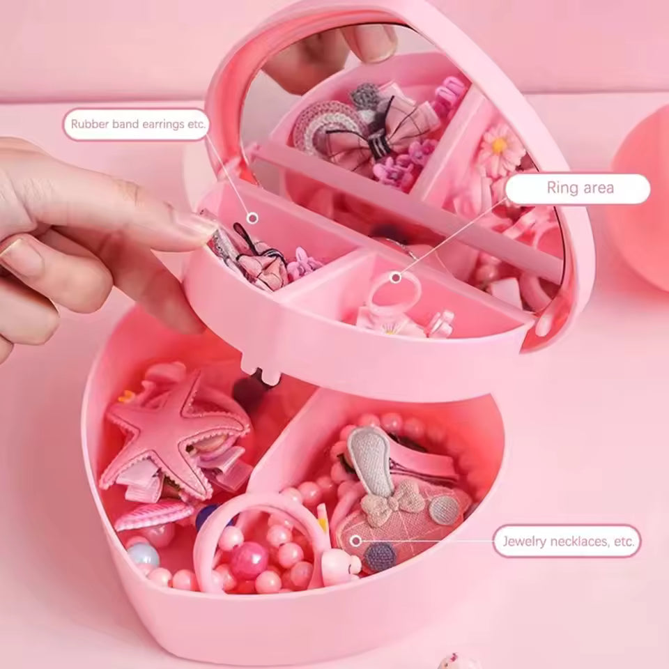 Pink heart shaped jewelry storage box by Clarifypk with compartments for rings, earrings, and necklaces