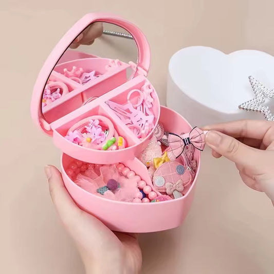 Pink heart shaped jewelry storage box by Clarify pk with compartments and a mirror inside