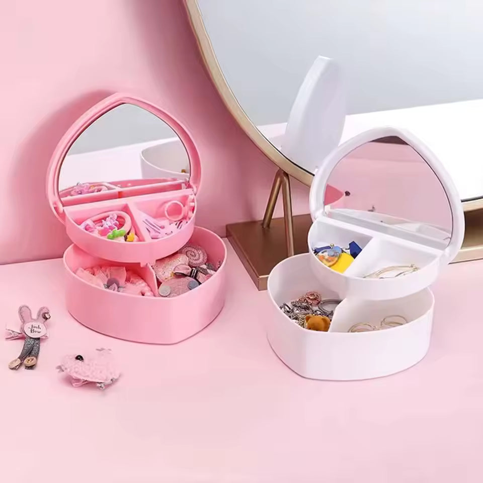 Heart shaped jewelry storage box in pink and white with compartments and built-in mirror by Clarify.pk