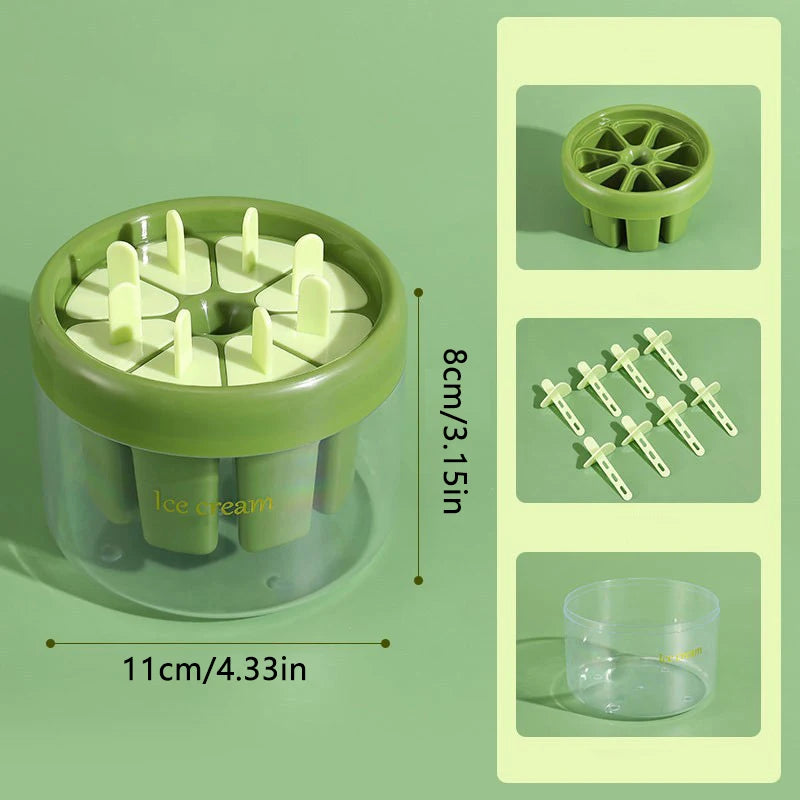 Compact green and transparent ice cream maker with popsicle molds and accessories by Clarify.pk