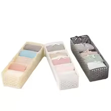 Organizer wardrobe storage boxes in beige white and gray for tidy closet organization