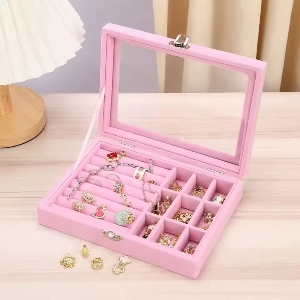 Clarify.pk pink cosmetic case open with pearl earring and ring organizer featuring multiple compartments