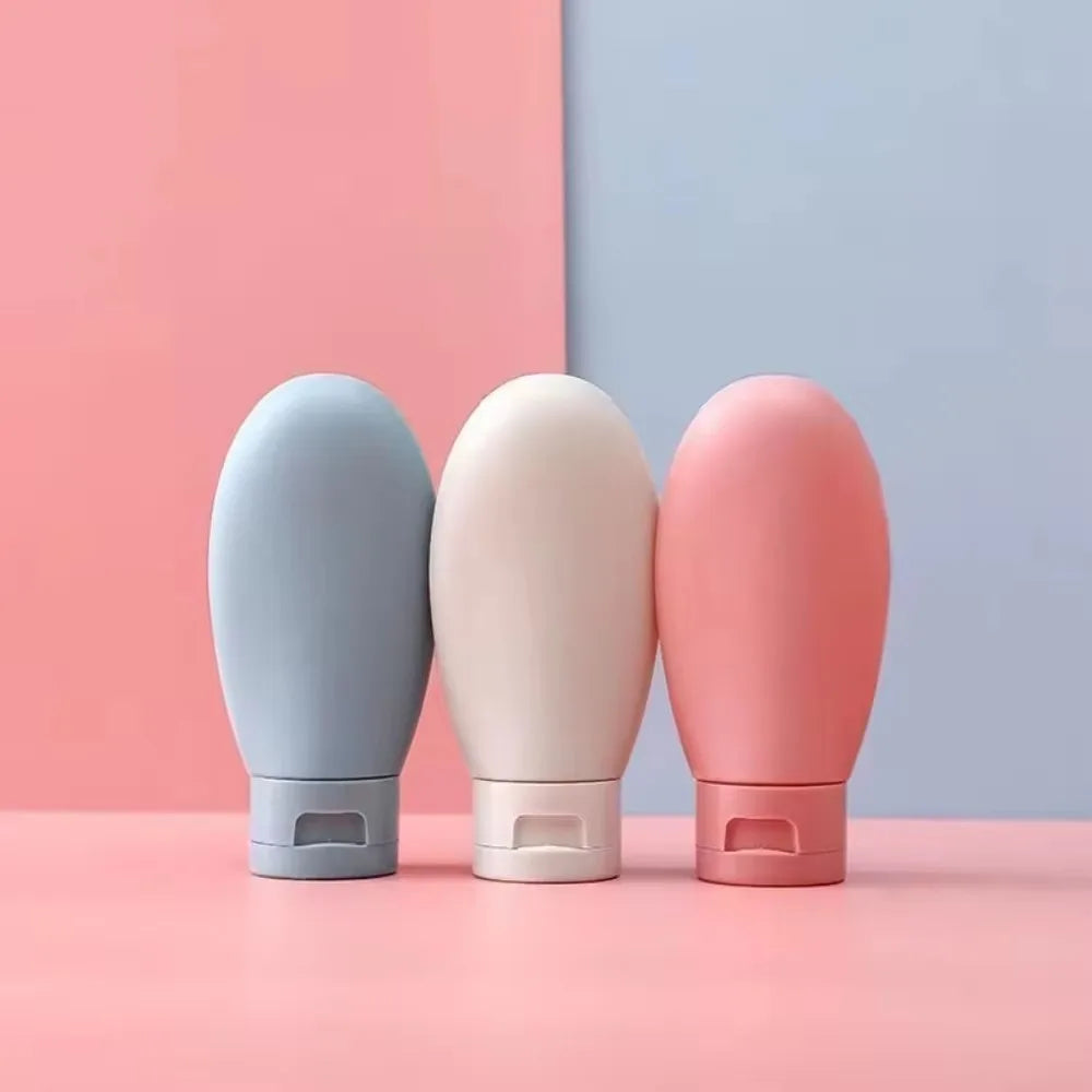 Clarify.pk portable lotion container 3 pack refillable silicone bottles in blue beige and pink