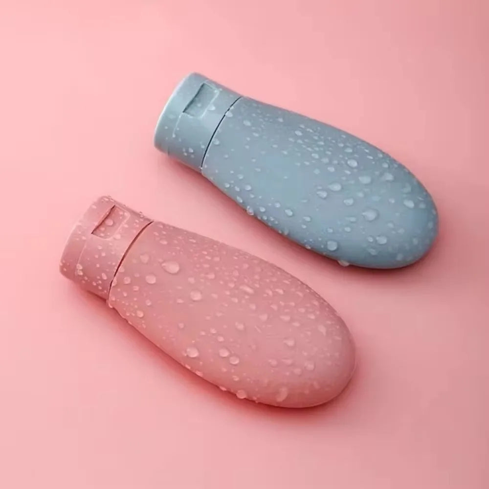 Clarify.pk portable lotion container 3 pack refillable bottles in pink and blue with water droplets