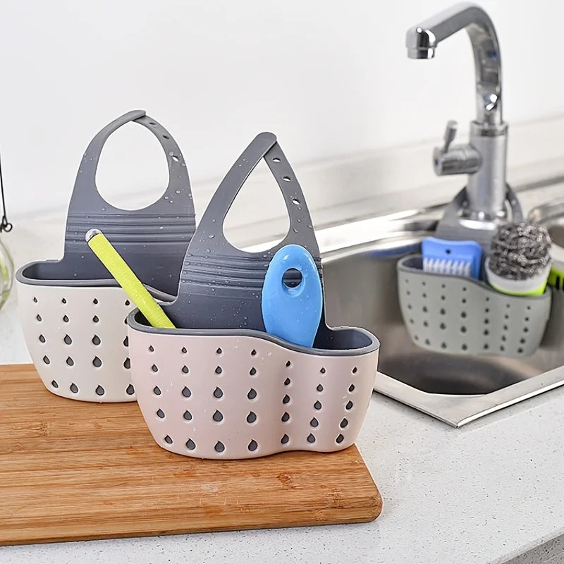 Clarify.pk sink hanging storage organizer in beige and gray with kitchen utensils near a stainless steel sink