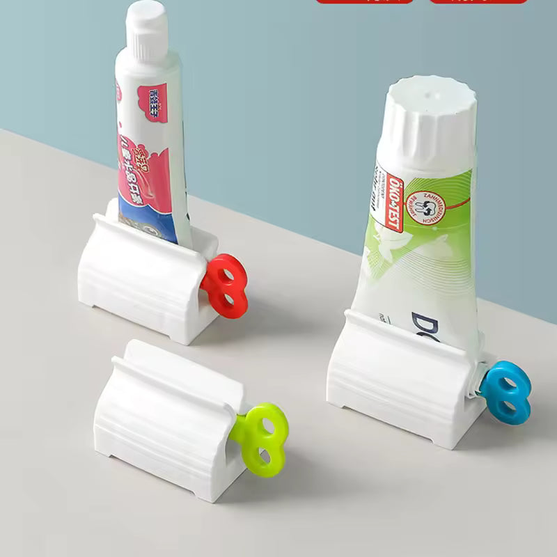 Clarify.pk white toothpaste tube squeezer with colorful winding keys for efficient toothpaste use