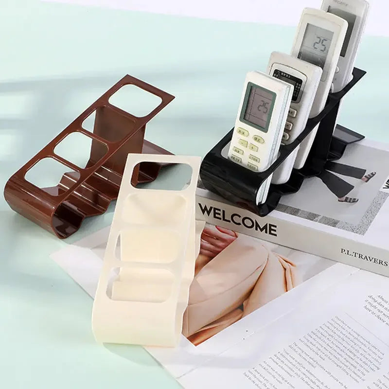 Clarify.pk TV remote stand holder in black, brown, and white for organizing multiple remotes