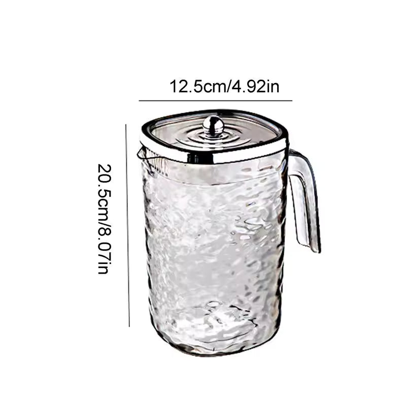 Clarify.pk glass juice pitcher with lid featuring textured glass design and metal lid