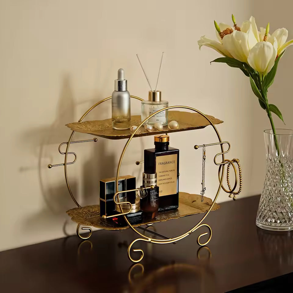 Clarify.pk 2 tier bathroom organizer with gold metal frame holding perfume, lotion, and jewelry