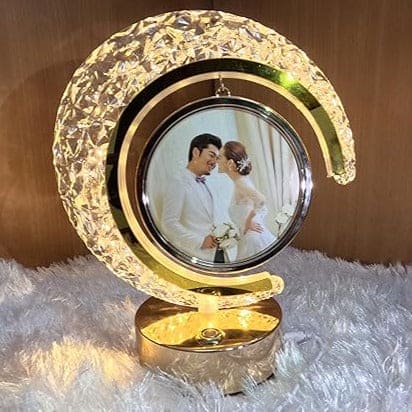 LED crystal moon photo lamp with gold base displaying a circular wedding photo frame