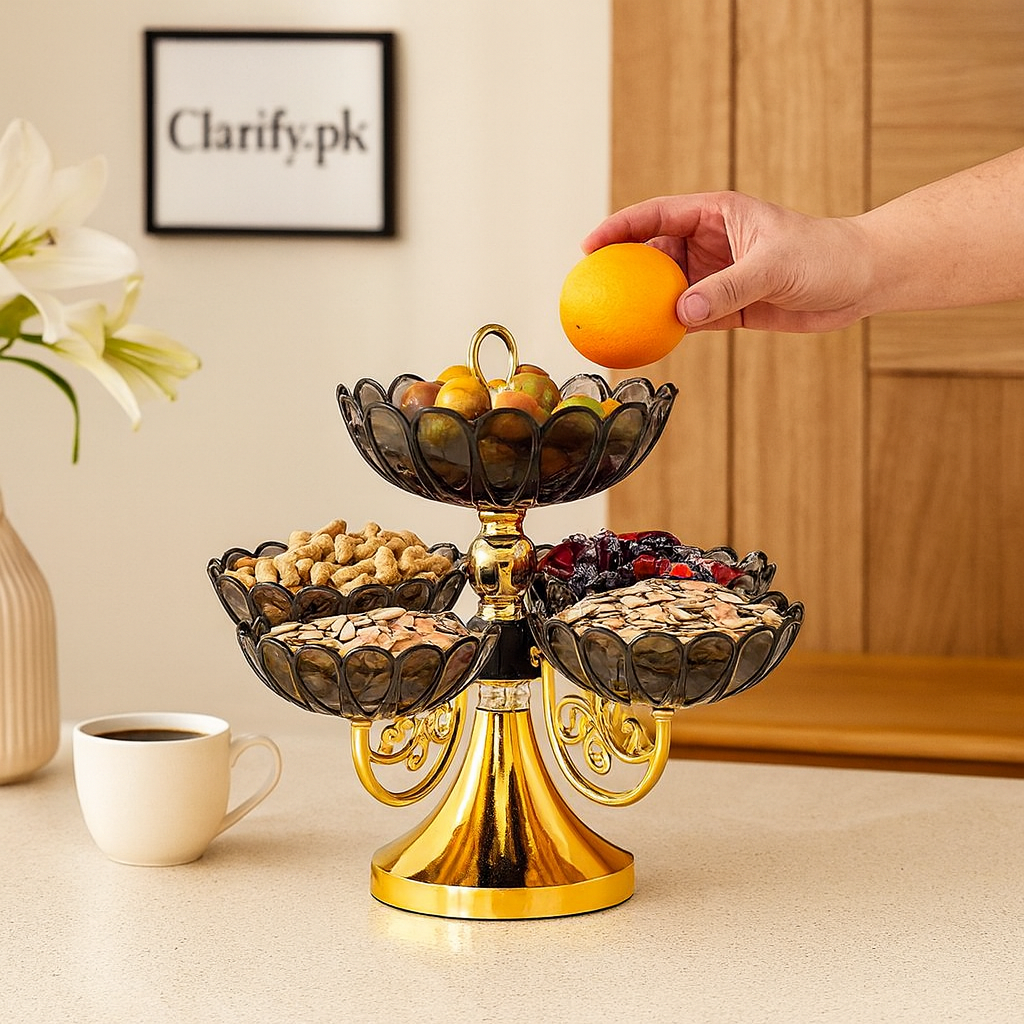 Clarify.pk plastic dry fruit tray with three compartments holding nuts and seeds, styled on a kitchen counter