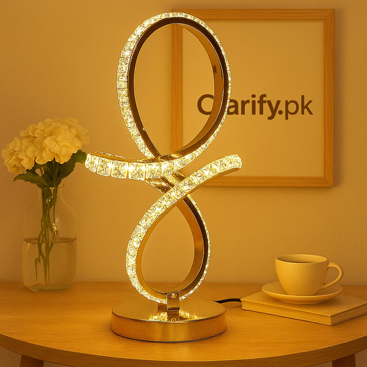 Clarify.pk modern decorative table lamp with glowing crystal loop design on wooden table