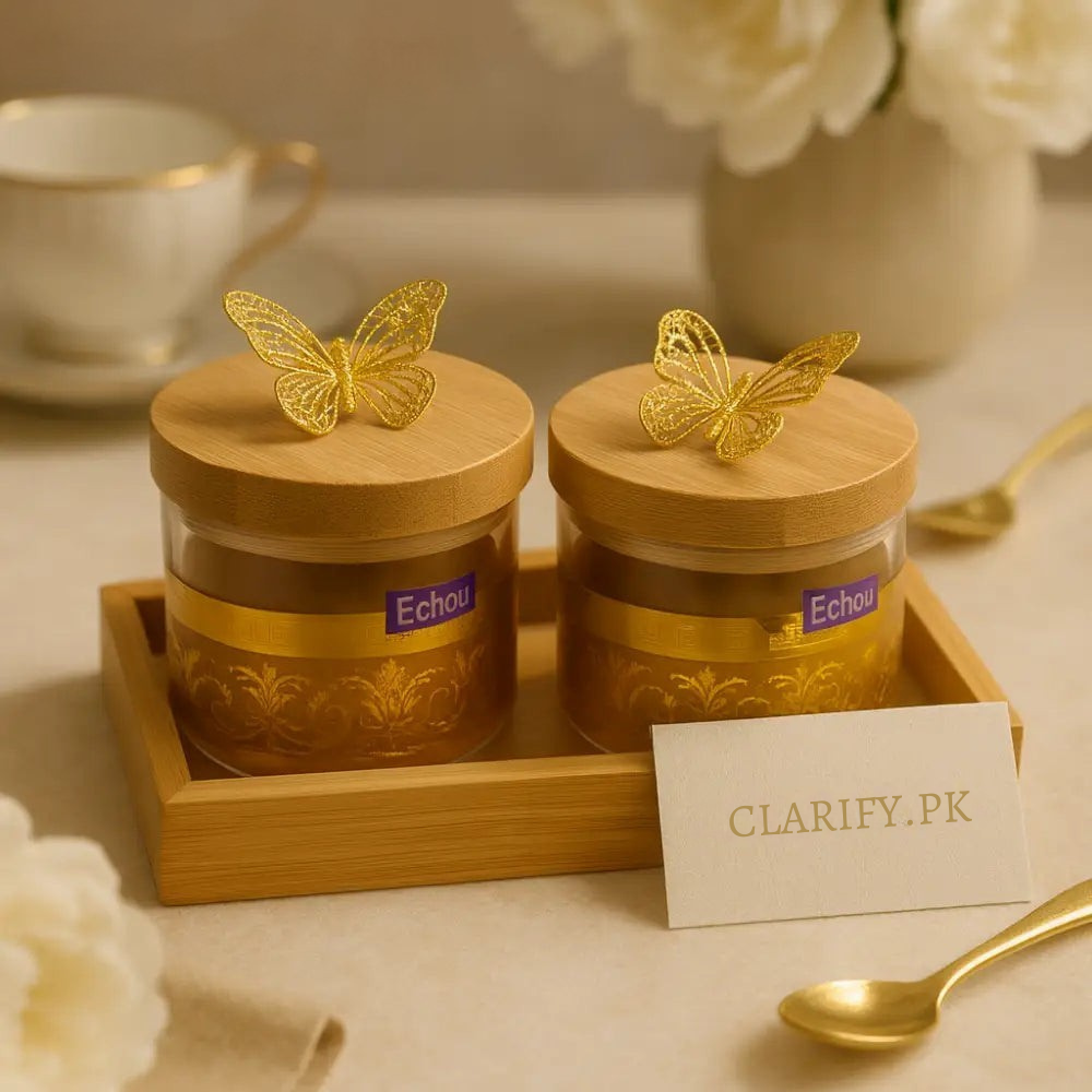 Golden kitchen jars with bamboo tray 2PCS featuring butterfly lids on wooden tray by Clarify.pk