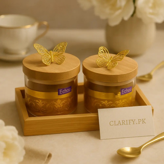 Golden kitchen jars with bamboo tray 2PCS featuring butterfly lids on wooden tray by Clarify.pk