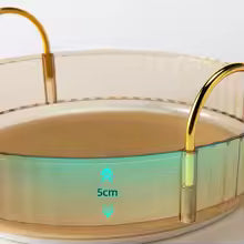 Clarify.pk 360 rotating makeup organizer with gold handles and transparent compartments