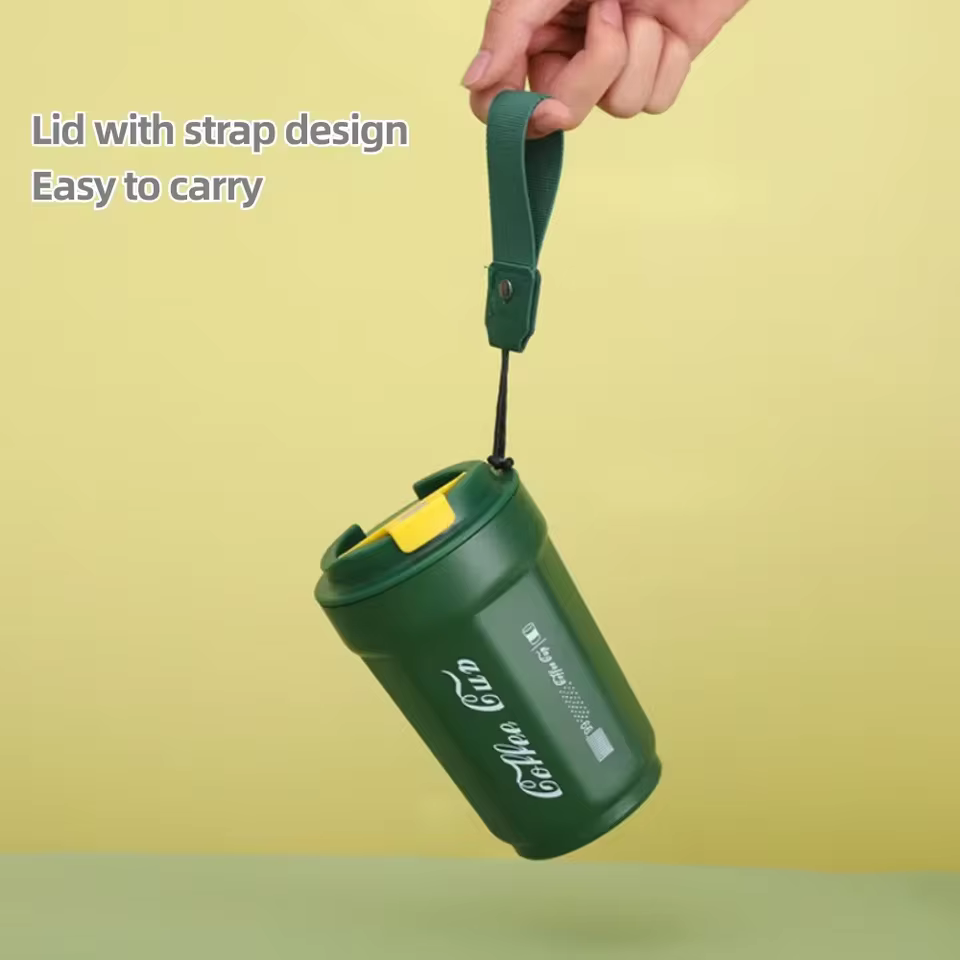 Leakproof thermos coffee mug in green with strap handle for easy carrying by Clarify.pk